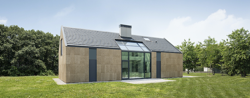 casa in legno paglia riso sughero